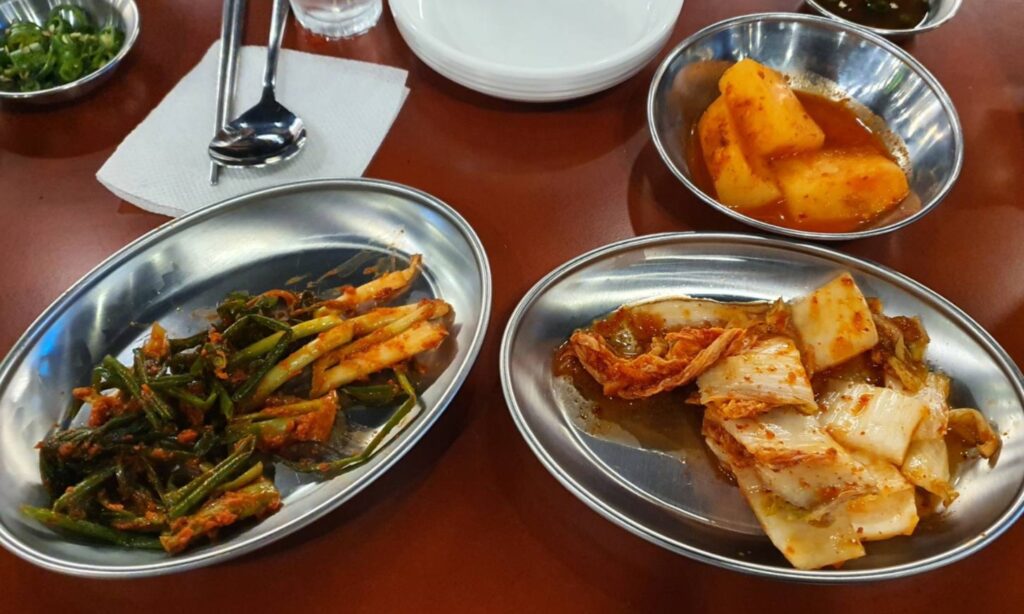 2 sort of kimchi at korean restaurant